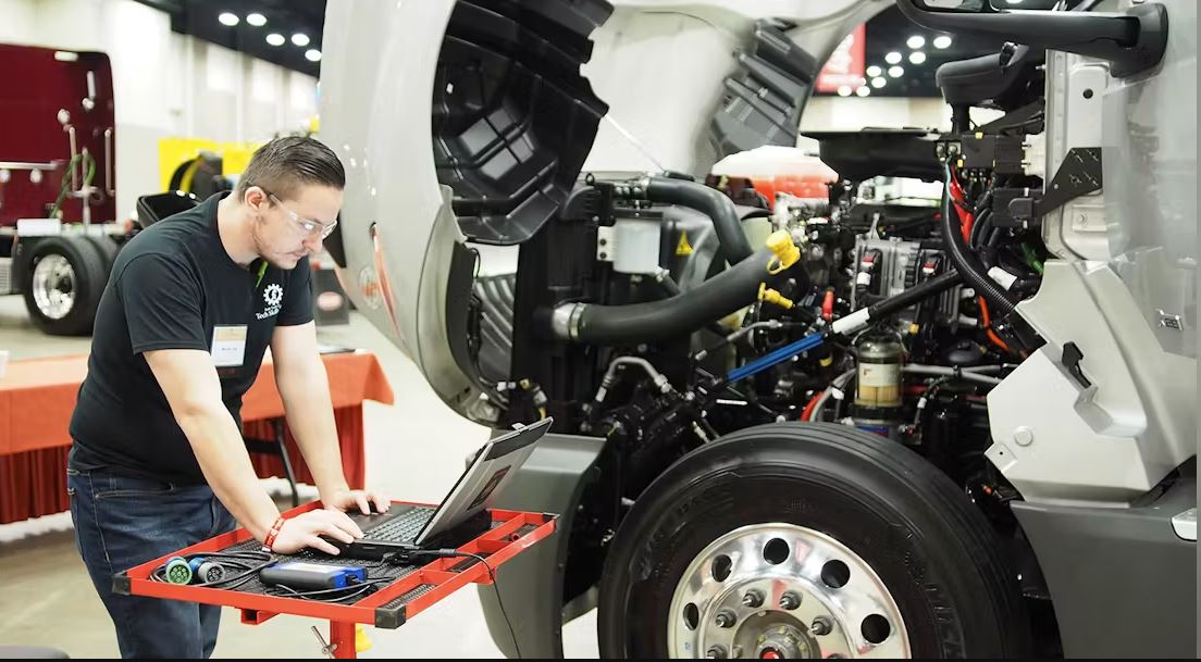 Mobile diesel mechanic performing engine diagnostics on a semi-truck in Santa Maria, CA